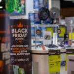 Black Friday boosts merchant and consumer sentiment, but interest and debt still slow consumption and investment