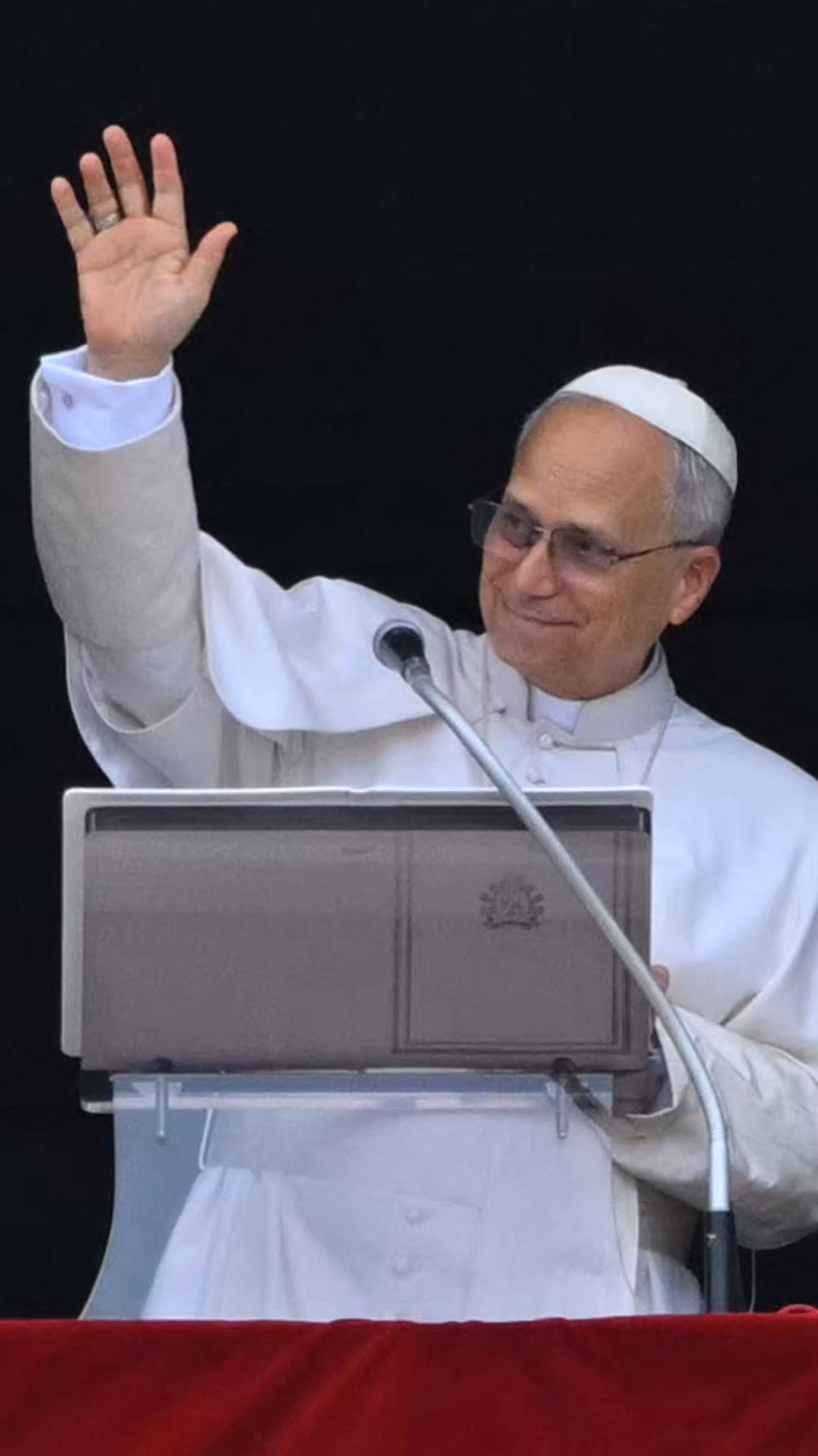 111499052-pope-leo-xiv-waves-from-the-window-of-the-apostolic-palace-overlooking-st-peters-square-d.avif