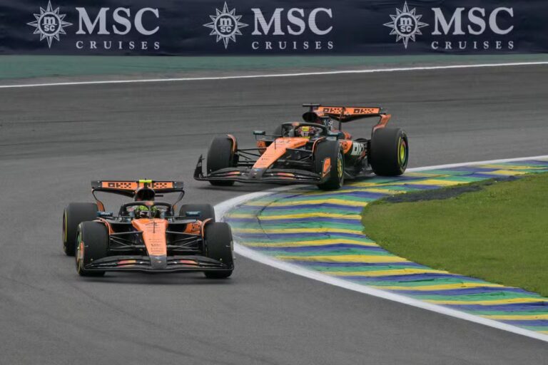 112966364-mclarens-british-driver-lando-norris-l-races-in-the-lead-ahead-of-mclarens-australia.jpg
