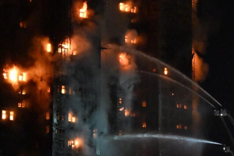 113132985-firefighters-spray-water-during-a-major-fire-at-the-wang-fuk-court-residential-estate-in-h.jpeg