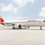 The International Air Transport Association is asking Venezuela to reconsider revoking licenses from airlines that have suspended their flights