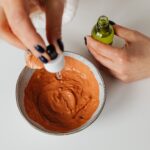 What is the purpose of mixing carrot peel and baking soda?