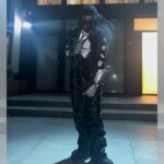 A theory with Timothée Chalamet sparks a search for a masked rapper