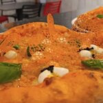 The pizza is from Pizzería Adrián which claims the flavor of Palma del Rio