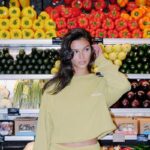 In Los Angeles: He is of Hispanic descent and is shown inside the famous supermarket where water costs $26