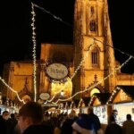 What time do the Christmas lights turn on in Oviedo today and where are the illuminated streets, trees and nativity scenes?