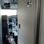 The surprising reason why pilots leave the cockpit door open before flights