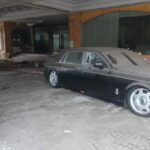 A collection of luxury cars found in an abandoned hotel have criminal connections