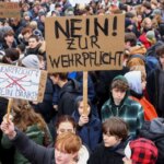 Thousands of young Germans protest against the new army