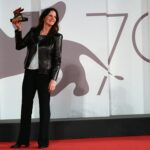 100450979-us-director-laura-poitras-poses-with-the-golden-lion-for-best-film-she-reveived-for-all-th.jpeg