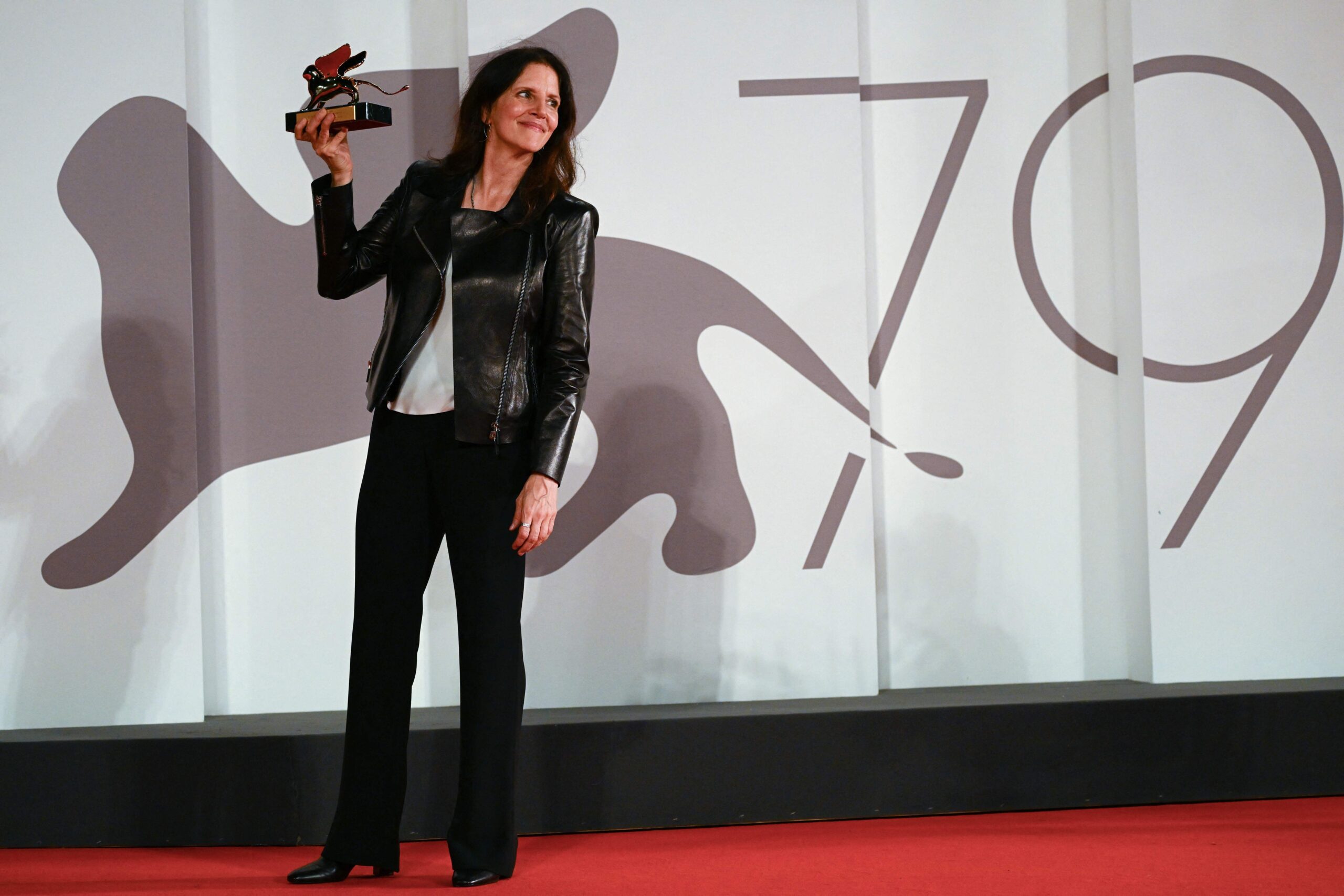 100450979-us-director-laura-poitras-poses-with-the-golden-lion-for-best-film-she-reveived-for-all-th.jpeg