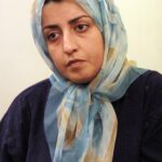 104572868-files-iranian-womens-rights-campaigner-narges-mohammadi-is-seen-at-her-home-in-tehran-on.j.jpeg