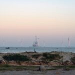 108804126-wind-turbines-are-seen-from-a-beach-on-pingtan-island-the-closest-point-in-china-to-taiwan.jpeg