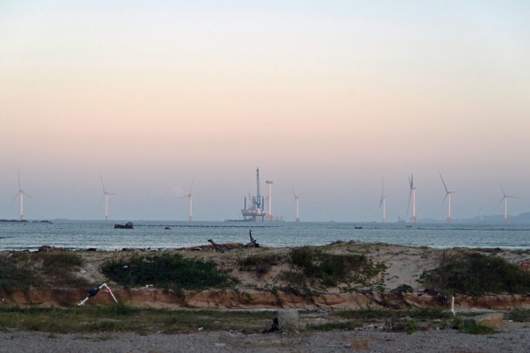108804126-wind-turbines-are-seen-from-a-beach-on-pingtan-island-the-closest-point-in-china-to-taiwan.jpeg