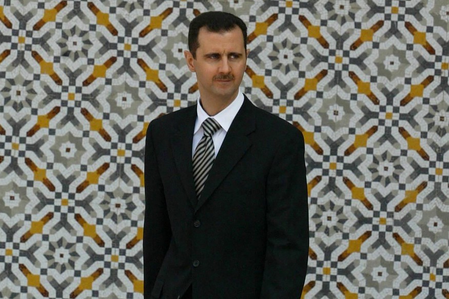 109395068-files-syrian-president-bashar-al-assad-waits-to-receive-his-lebanese-counterpart-on-ma.jpg