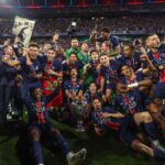 111252545-topshot-paris-saint-germains-players-celebrate-with-the-trophy-after-winning-the-uefa-c.jp_.jpeg