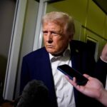 112804815-in-flight-october-24-us-president-donald-trump-takes-a-question-from-a-reporter-aboa.jpg