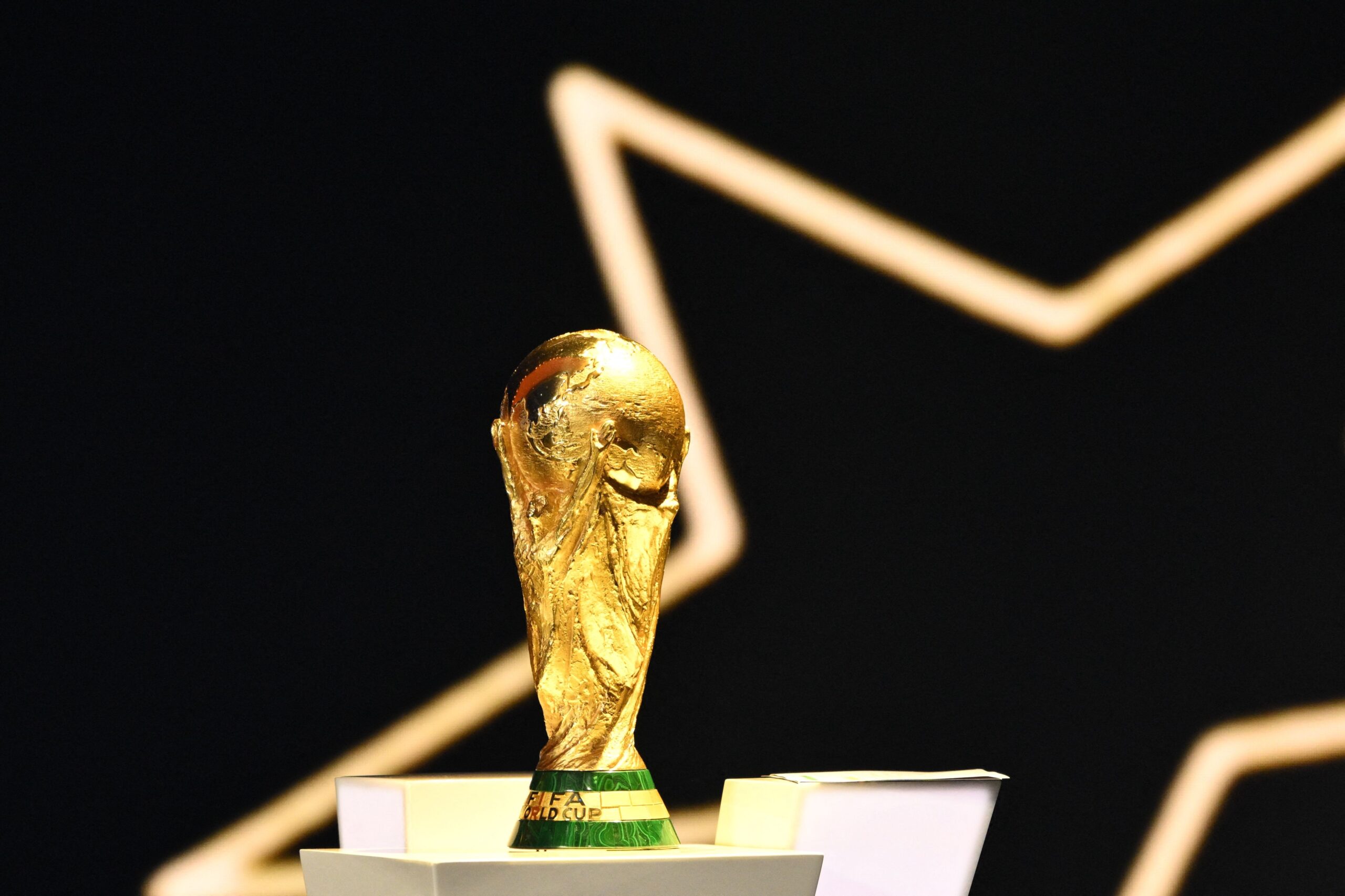 113222895-the-fifa-world-cup-trophy-is-displayed-on-the-stage-during-the-draw-for-the-2026-fifa.jpg