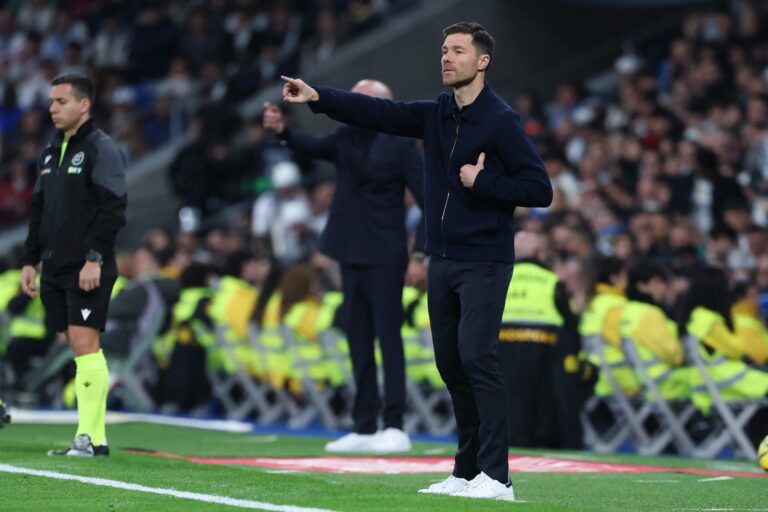113249270-real-madrids-spanish-coach-xabi-alonso-gestures-to-players-during-the-spanish-league-foot.jpeg