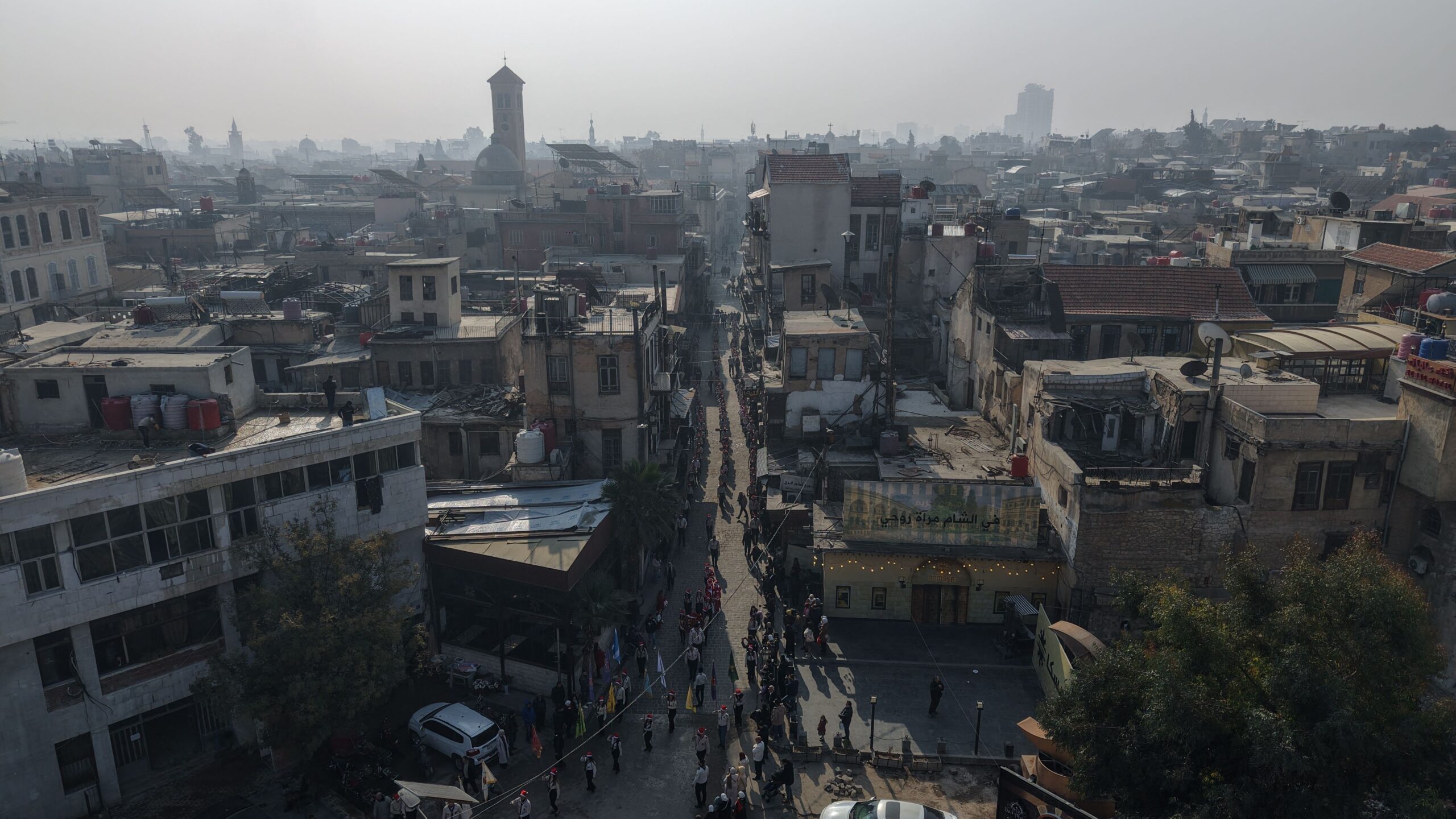113382243-syrian-scouts-play-music-in-the-street-as-part-of-christmas-celebrations-in-the-old-ci.jpg