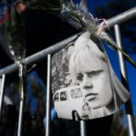 113401134-topshot-portraits-of-late-french-actress-brigitte-bardot-and-flowers-are-displayed-o.jpg