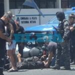 A motor police officer was taken to hospital after a collision with a car