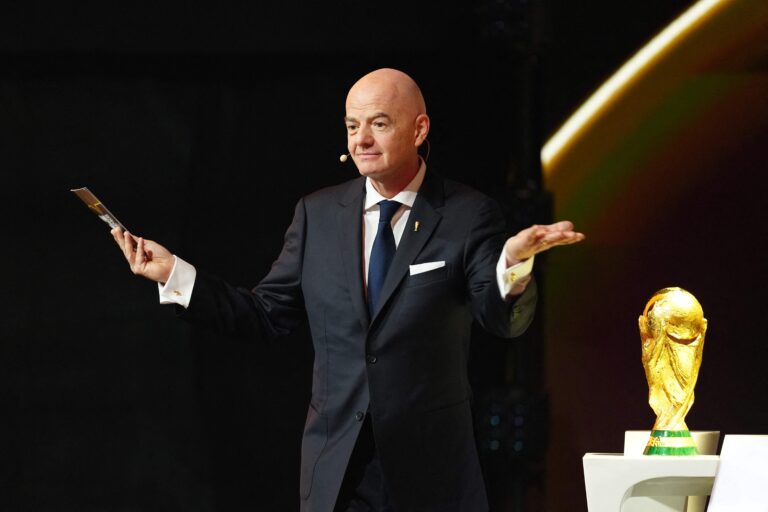 1766240842_113220533-italian-fifa-president-gianni-infantino-shows-the-card-reading-fifa-during-the-draw-fo.jpg