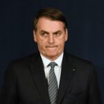 1766782857_113127446-files-brazilian-president-jair-bolsonaro-gestures-during-the-inauguration-ceremony-of-braz.jpeg