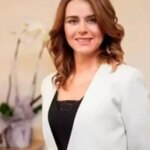 A former bank manager has been jailed after running a million-dollar scam on players