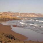 They are investigating the death of a man who was found naked and bloodied on the beach in Gran Canaria