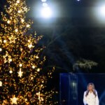 Trump and the First Lady light the Christmas tree at the White House