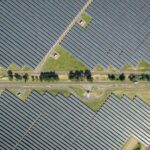 92976900-photovoltaic-modules-on-an-aes-tiete-sa-solar-farm-in-guaimbe-sao-paulo-state-brazil-on-thu.jpeg