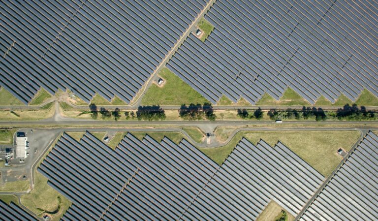 92976900-photovoltaic-modules-on-an-aes-tiete-sa-solar-farm-in-guaimbe-sao-paulo-state-brazil-on-thu.jpeg