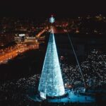 What time do the Christmas lights turn on in Badalona and where are the illuminated streets and the tree?