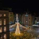 What time do the Christmas lights turn on in Lyon and where are the illuminated streets?