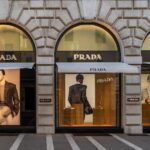 Prada has completed its purchase of Versace and will seek to compete head-to-head with Louis Vuitton