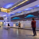 Why did the stock market rise as a suppression in GDP knocked Brazil out of the group of ten largest economies?