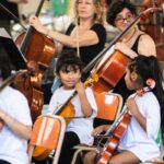 He teaches opera in popular neighborhoods of the city and his orchestra has been invited to perform at the Vatican