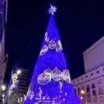 What time do the Christmas lights turn on in Alicante today and where are the illuminated streets, trees and nativity scenes?