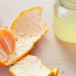 What is the purpose of mixing tangerine peel with white vinegar?