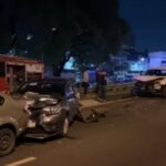 One of the cars was towing another, so a driver got out to help and was injured and killed in a multiple collision.