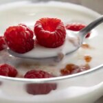 yogurt-with-raspberries-high-angle-u85nux5vkz8m.jpg